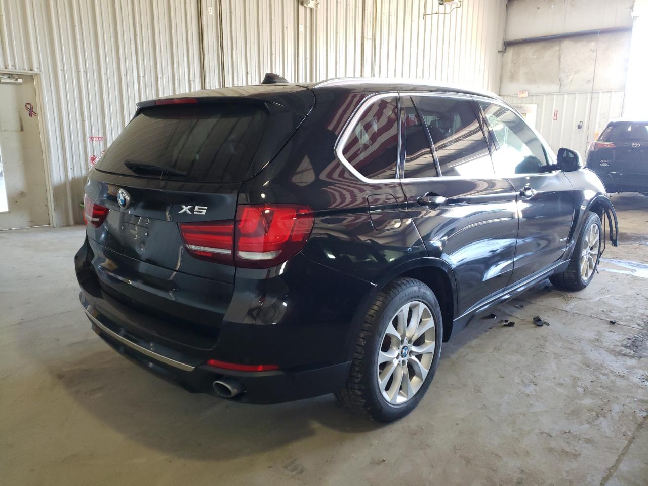 Photo 4 from auction – 2014 BMW X5 XDRIVE3 with VIN 5UXKR0C55E0H18299