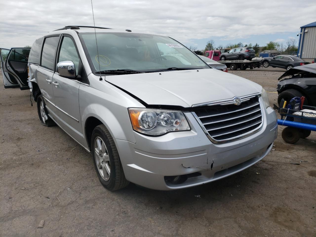 CHRYSLER TOWN & COU 2010 with VIN 2A4RR8DX7AR374898 - Photo from auction