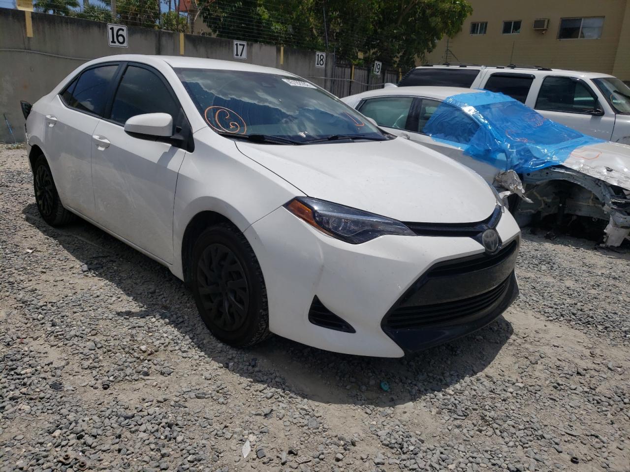 TOYOTA COROLLA 2017 with VIN 5YFBURHE2HP659989 - Photo from auction