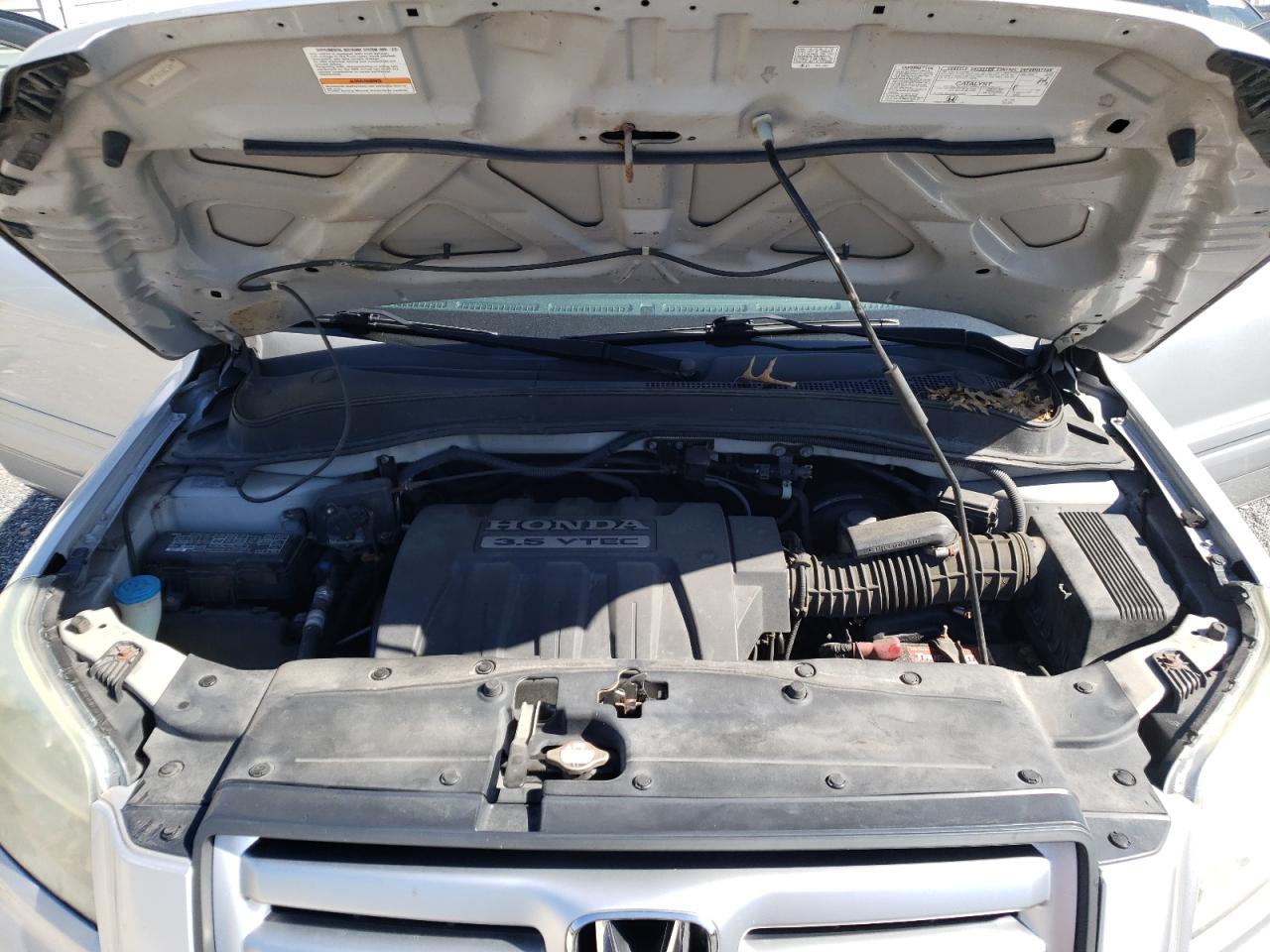 Photo 7 from auction – 2006 HONDA PILOT EX with VIN 5FNYF18606B013695