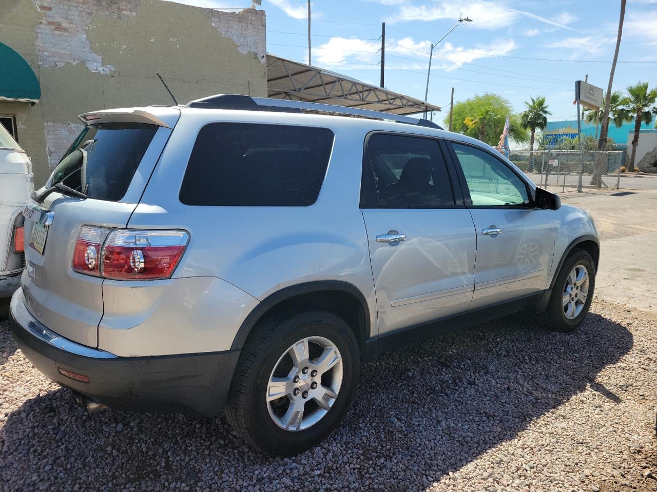 Photo 4 from auction – 2011 GMC ACADIA SLE with VIN 1GKKRNED6BJ185440