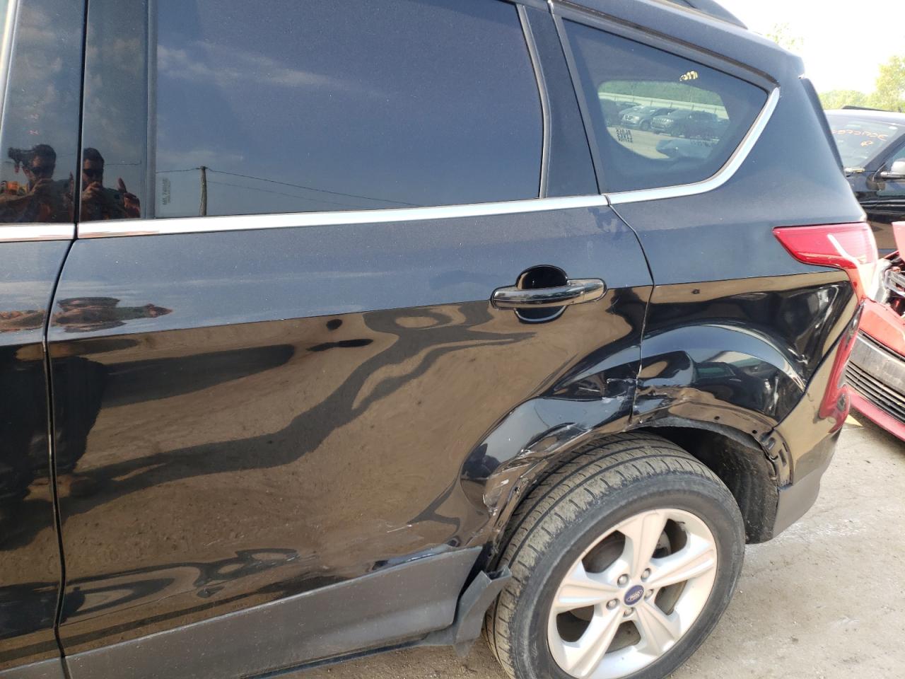 Photo 9 from auction – 2013 FORD ESCAPE SE with VIN 1FMCU0G97DUD95102