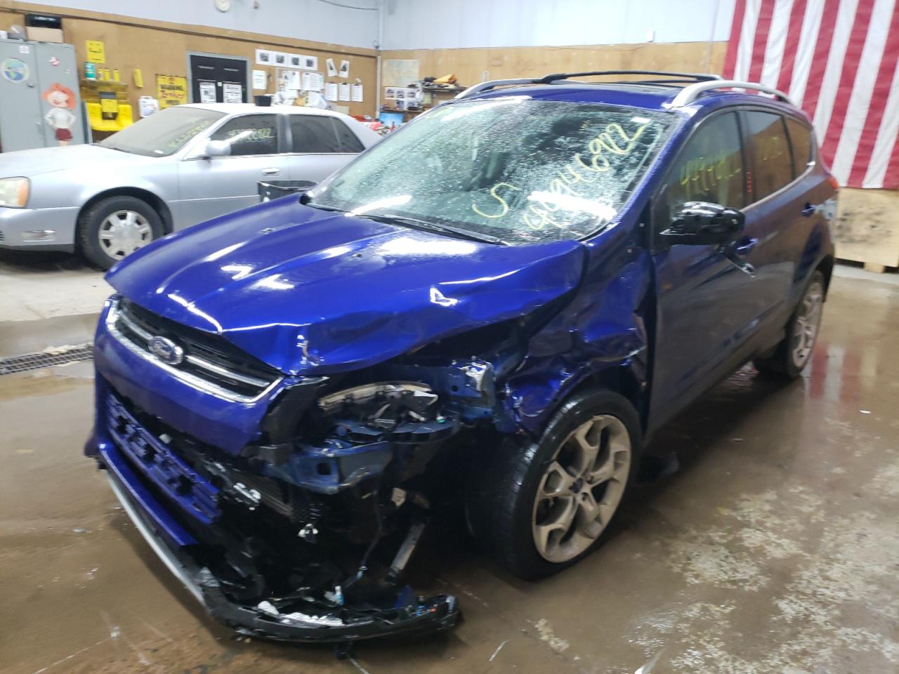 Photo 2 from auction – 2014 FORD ESCAPE TIT with VIN 1FMCU0J93EUC51329