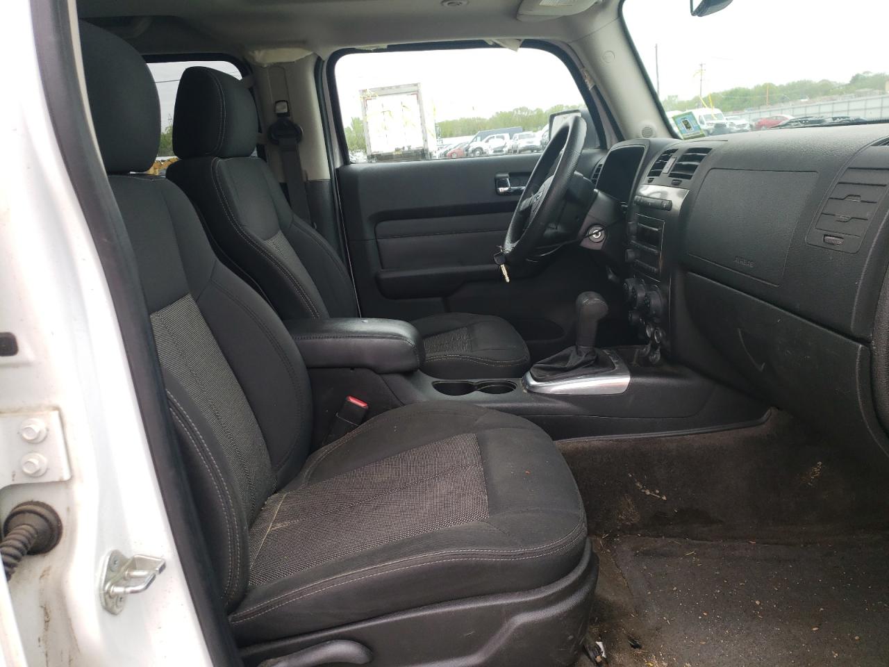 Photo 5 from auction – 2009 HUMMER H3 with VIN 5GTEN13E498115986