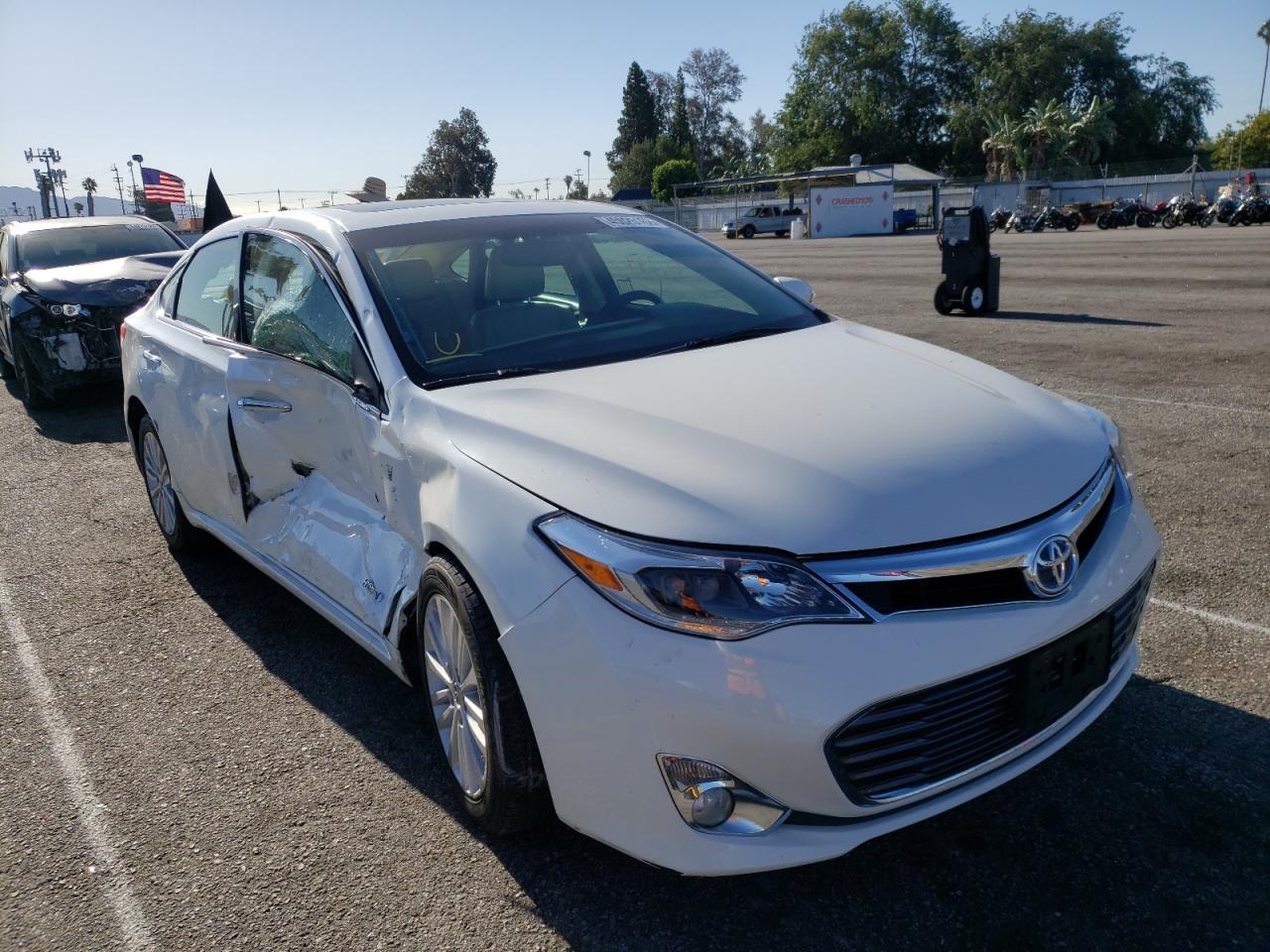 TOYOTA AVALON HYB 2013 with VIN 4T1BD1EB0DU015332 - Photo from auction
