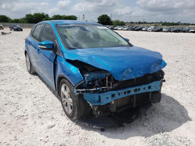 FORD FOCUS SE 2014 with VIN 1FADP3K29EL175128 - Photo from auction