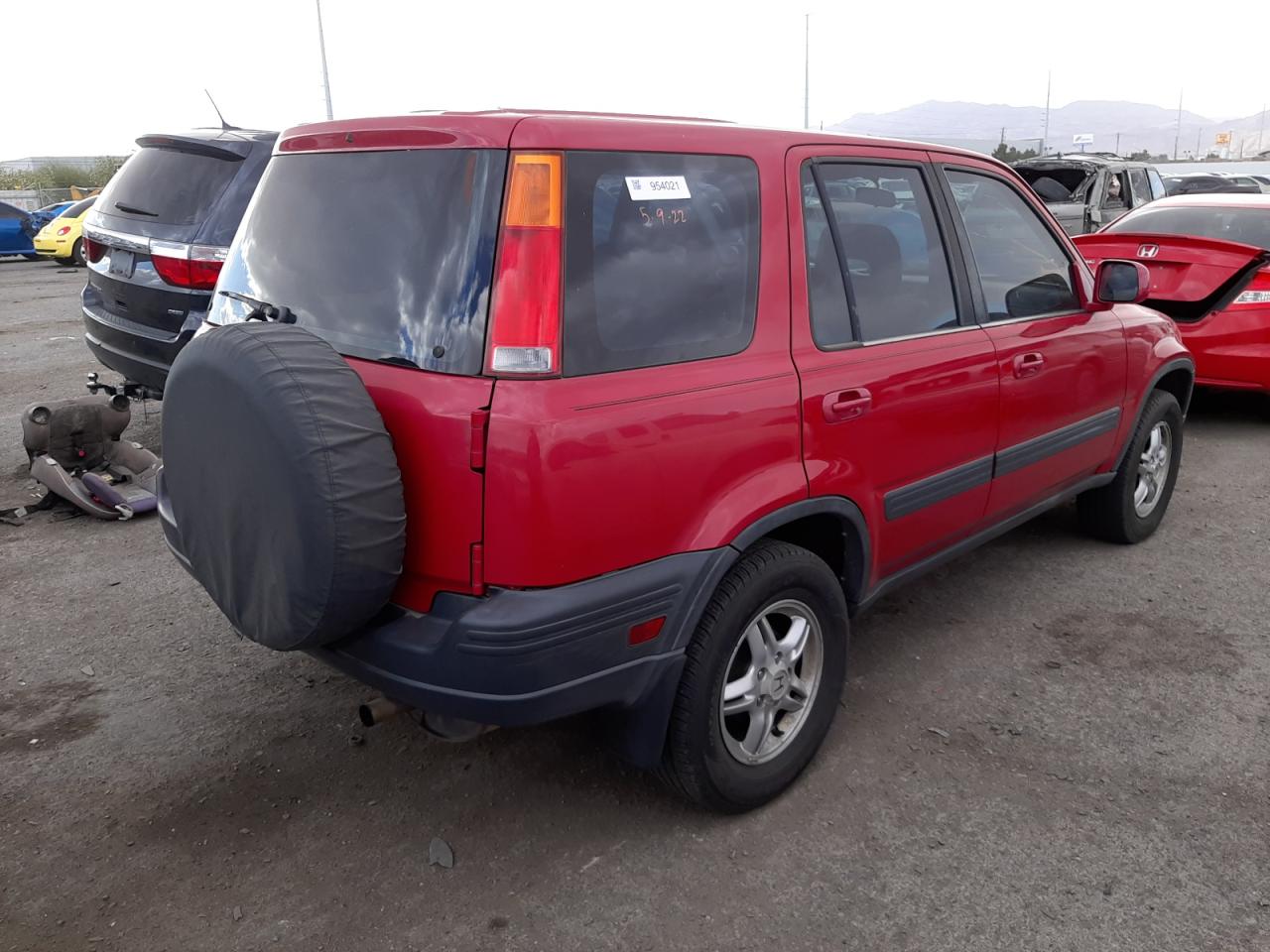 Photo 4 from auction – 1999 HONDA CR-V EX with VIN JHLRD1865XC038880