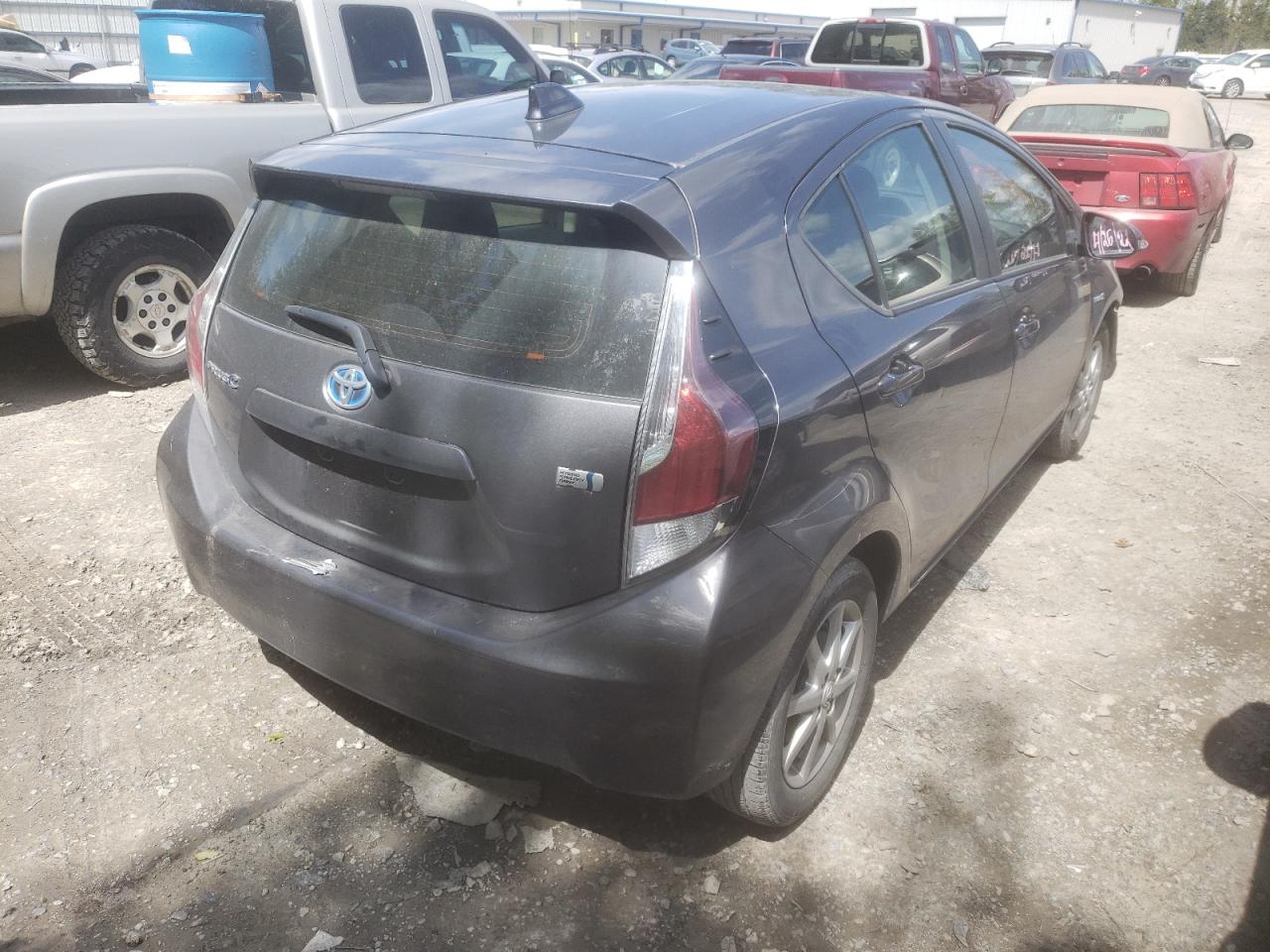 Photo 4 from auction – 2015 TOYOTA PRIUS C with VIN JTDKDTB37F1101724