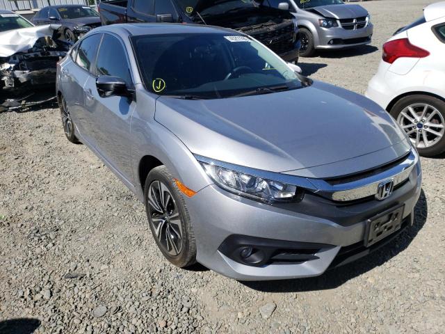 HONDA CIVIC EX 2018 with VIN JHMFC1F32JX000792 - Photo from auction