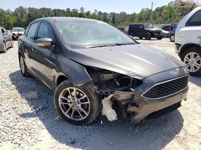 FORD FOCUS SE 2015 with VIN 1FADP3F23FL289735 - Photo from auction