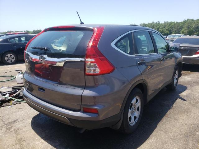 Photo 4 from auction – 2015 HONDA CR-V LX with VIN 5J6RM3H39FL001032