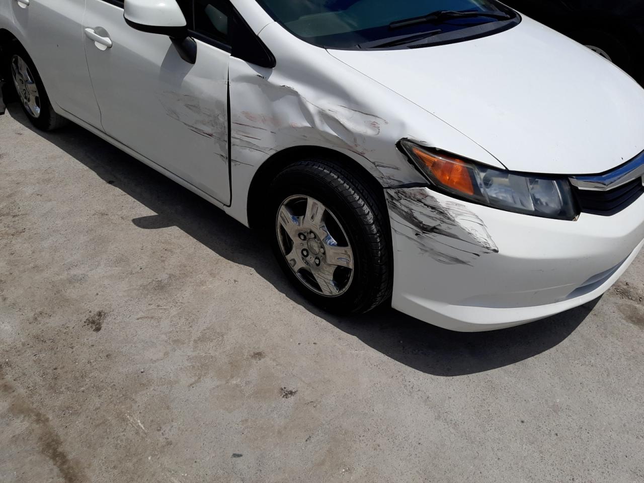 Photo 9 from auction – 2012 HONDA CIVIC LX with VIN 2HGFB2F50CH563702