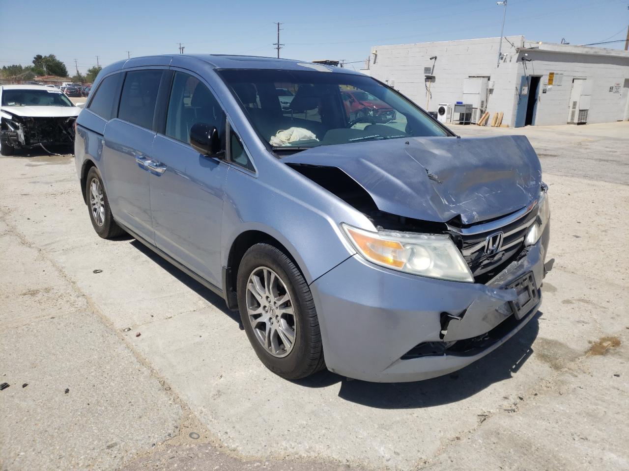 HONDA ODYSSEY EX 2011 with VIN 5FNRL5H64BB083716 - Photo from auction