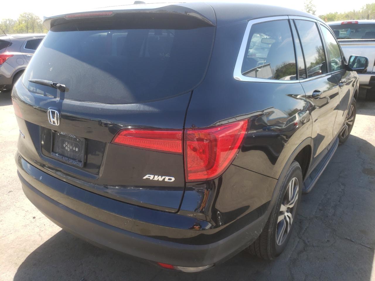 Photo 4 from auction – 2016 HONDA PILOT EXL with VIN 5FNYF6H84GB047509