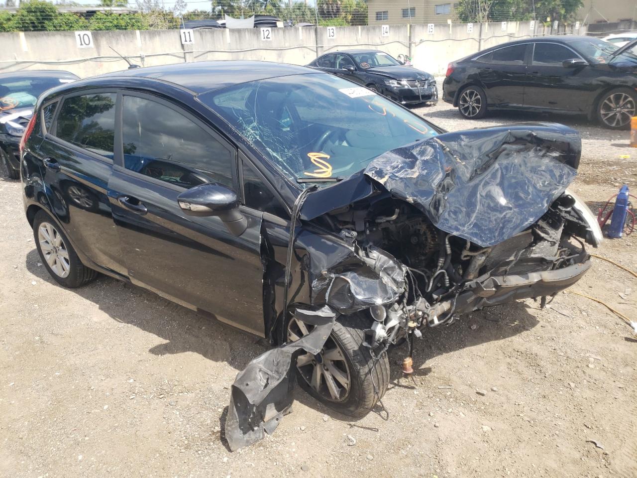 FORD FIESTA SE 2013 with VIN 3FADP4EJ2DM152411 - Photo from auction