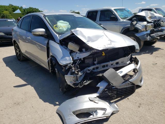 FORD FOCUS SE 2017 with VIN 1FADP3FE1HL289357 - Photo from auction