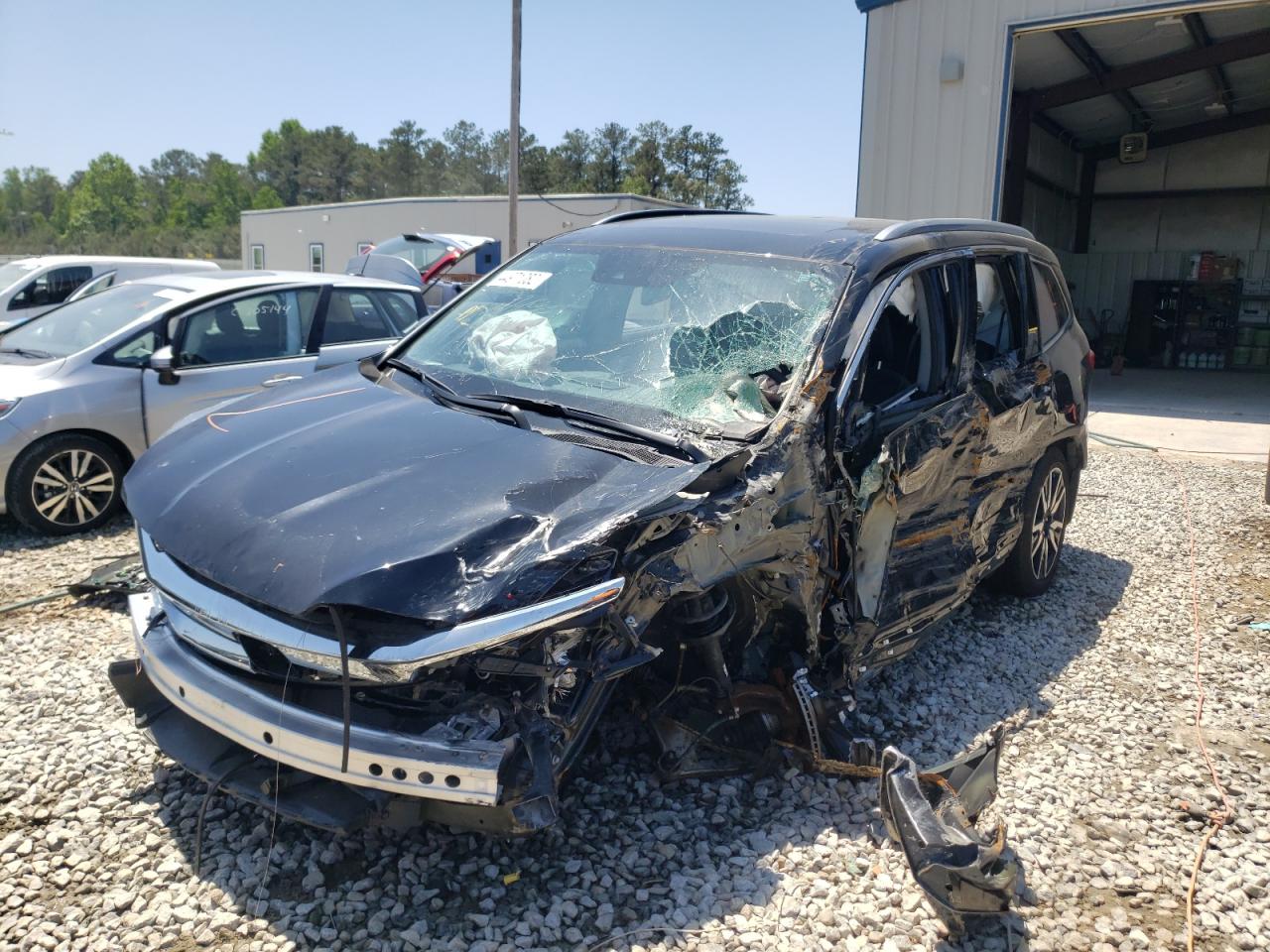 Photo 2 from auction – 2021 HONDA PILOT ELIT with VIN 5FNYF6H04MB025757