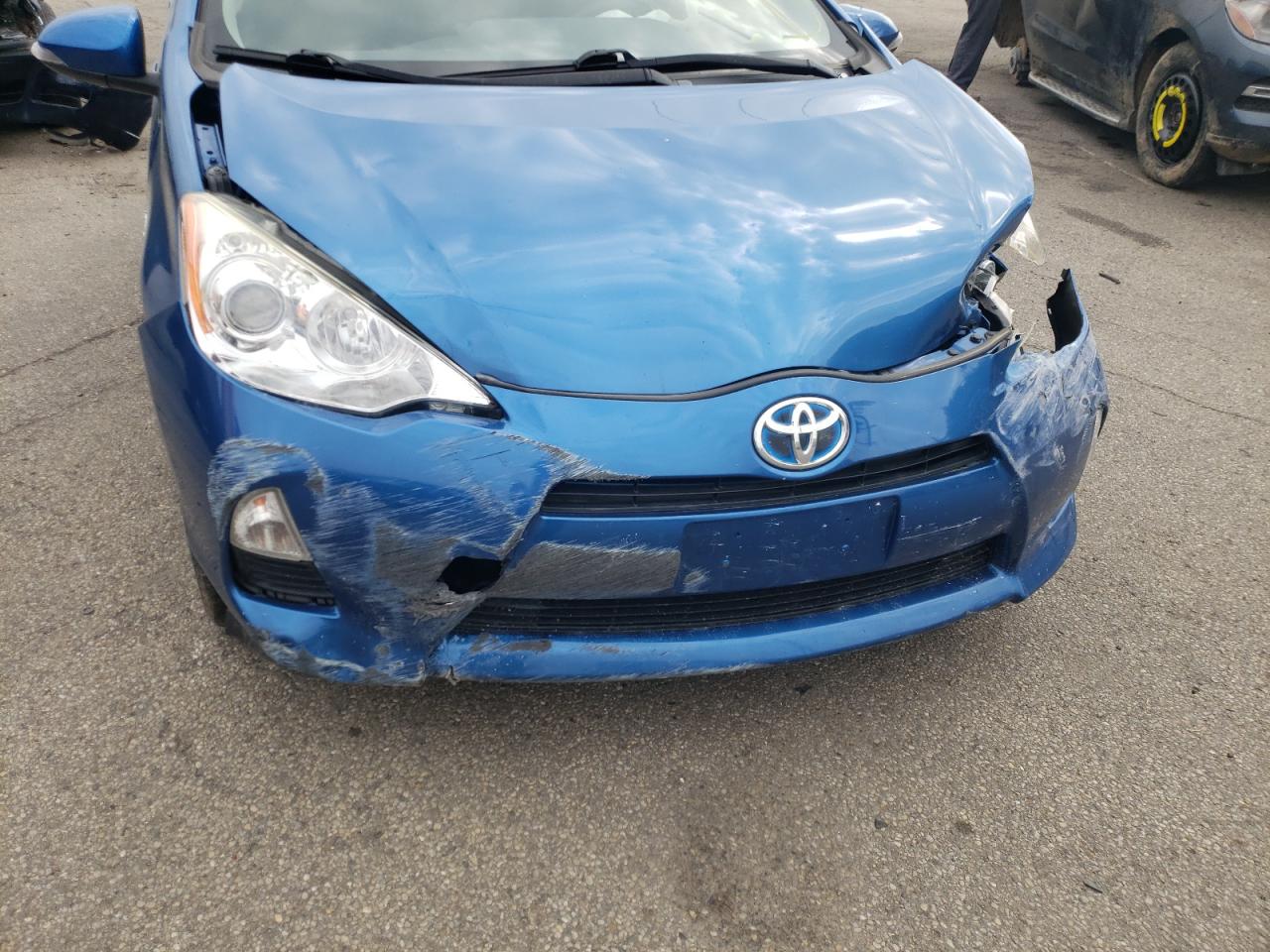 Photo 9 from auction – 2014 TOYOTA PRIUS C with VIN JTDKDTB34E1571420