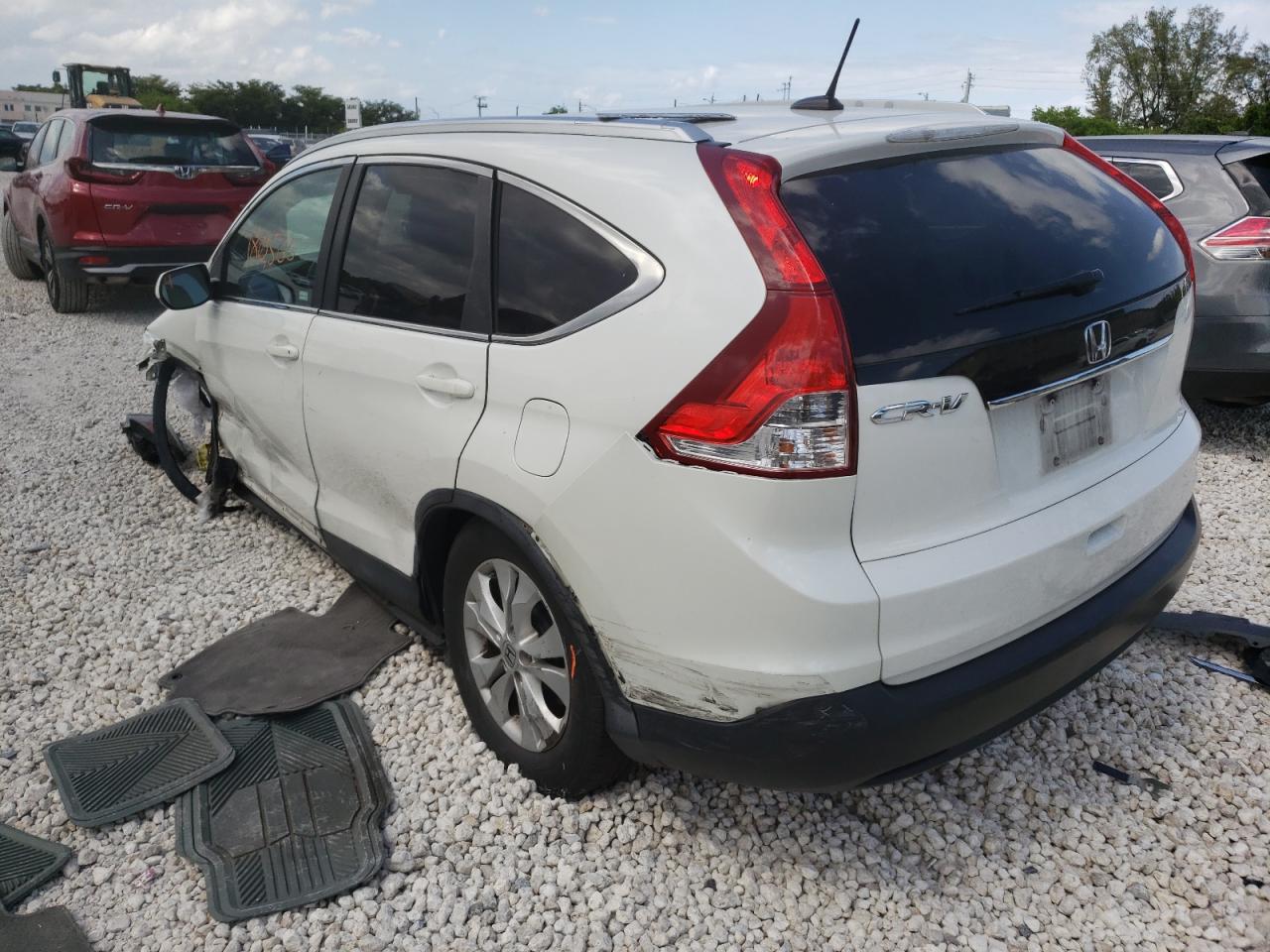 Photo 3 from auction – 2014 HONDA CR-V EXL with VIN 5J6RM3H74EL009590