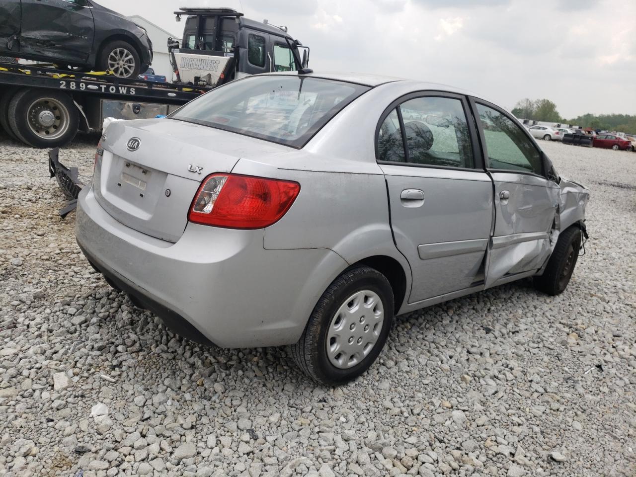 Photo 4 from auction – 2011 KIA RIO BASE with VIN KNADH4A34B6913125
