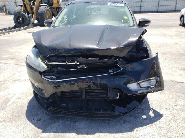 Foto 9 de la subasta – 2016 FORD FOCUS SE con VIN 1FADP3K21GL246373