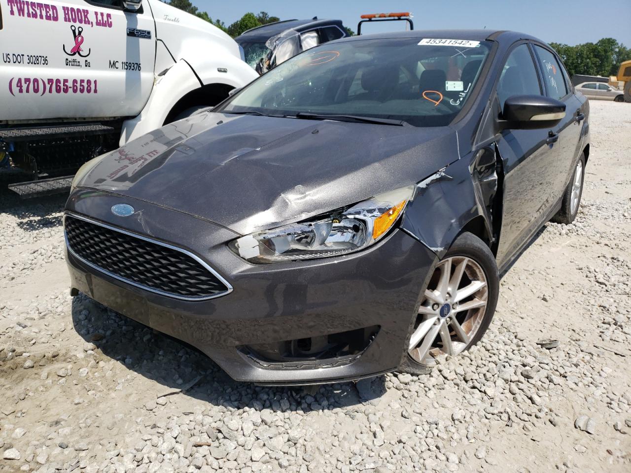 Photo 9 from auction – 2015 FORD FOCUS SE with VIN 1FADP3F23FL253026