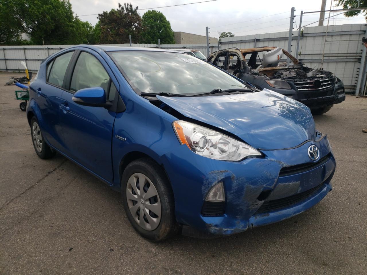 TOYOTA PRIUS C 2014 with VIN JTDKDTB34E1571420 - Photo from auction
