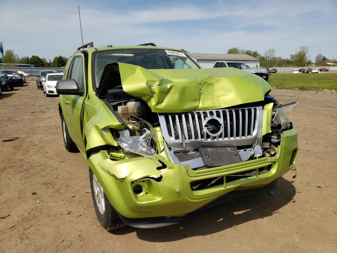 Photo 19 from auction – 2011 MERCURY MARINER with VIN 4M2CN8B74BKJ01602