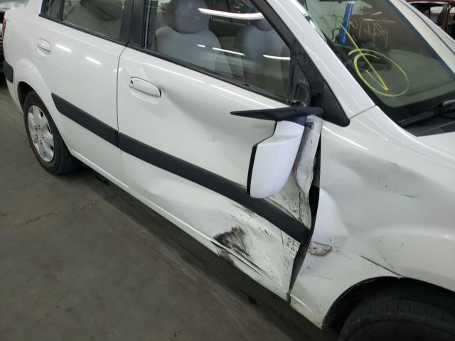 Photo 9 from auction – 2006 KIA RIO with VIN KNADE123866124312