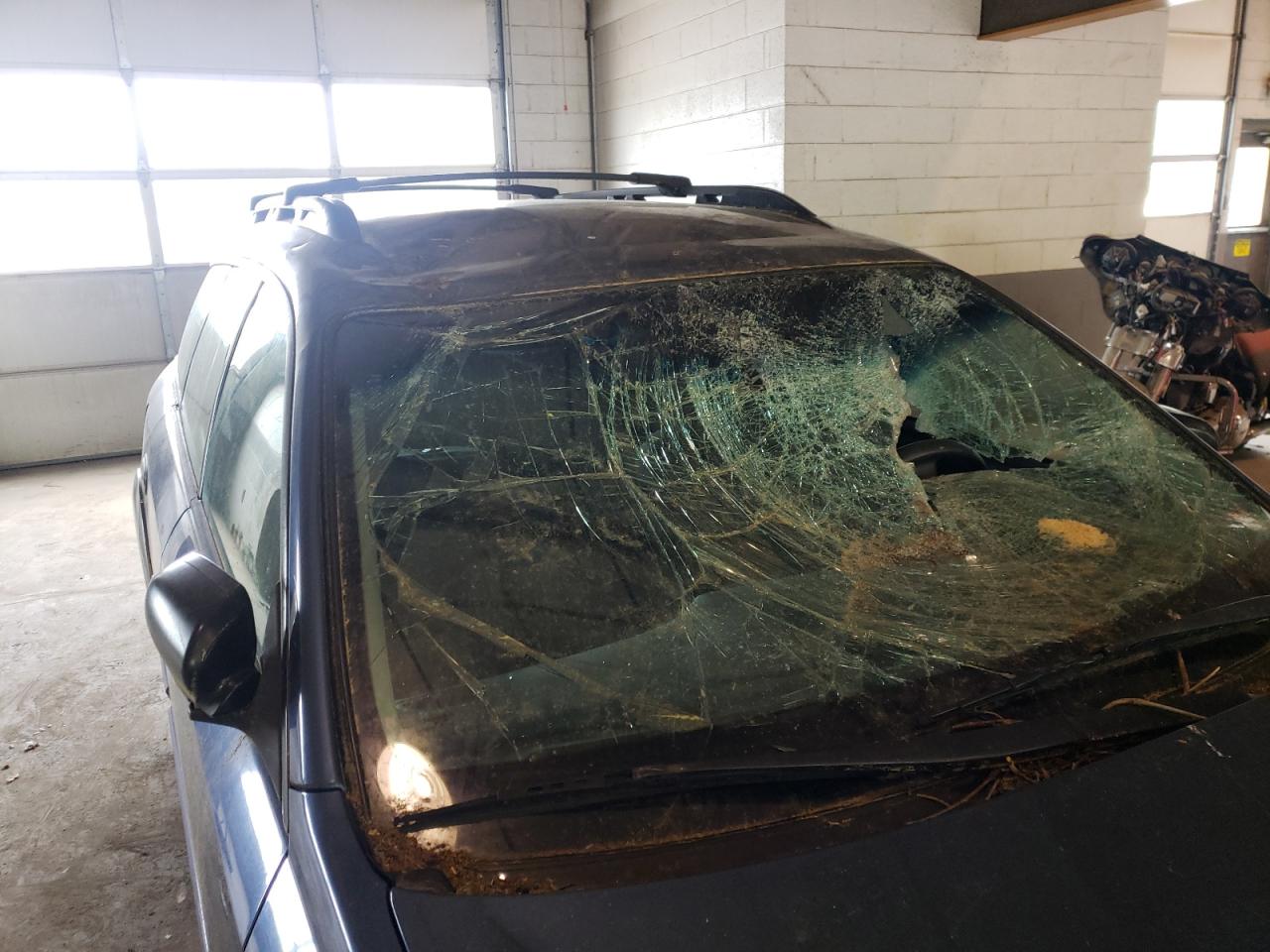 Photo 9 from auction – 2005 SUBARU LEGACY OUT with VIN 4S4BP61C557368720