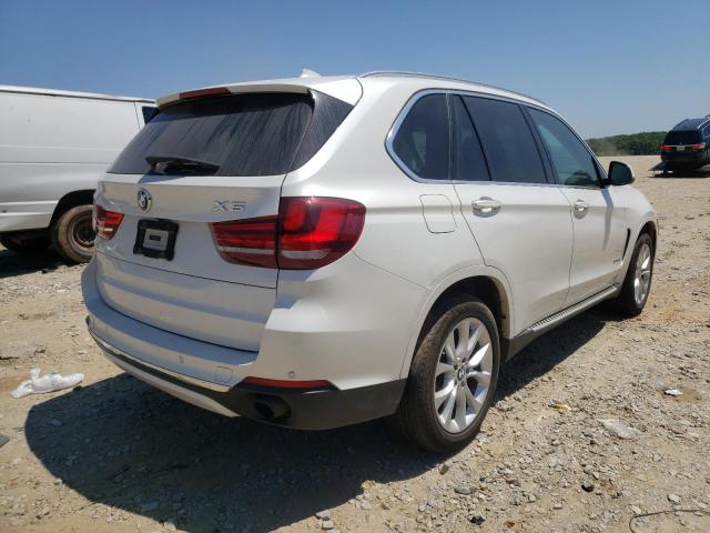 Photo 4 from auction – 2014 BMW X5 XDRIVE3 with VIN 5UXKR0C5XE0H21988