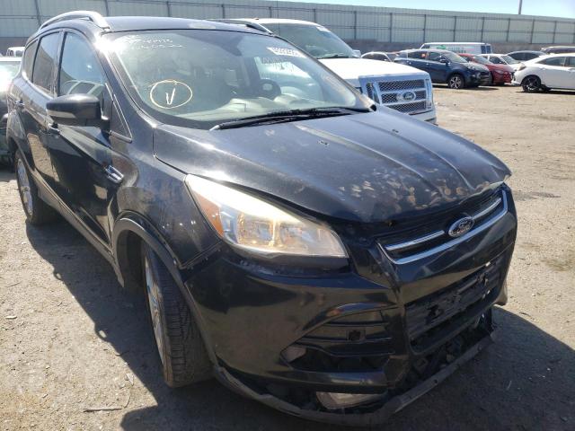 FORD ESCAPE TIT 2014 with VIN 1FMCU0JX1EUC38612 - Photo from auction