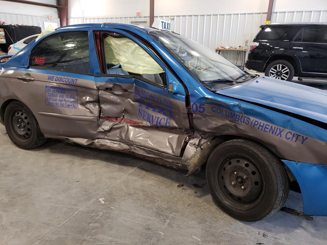 Photo 9 from auction – 2009 KIA SPECTRA EX with VIN KNAFE221295631150