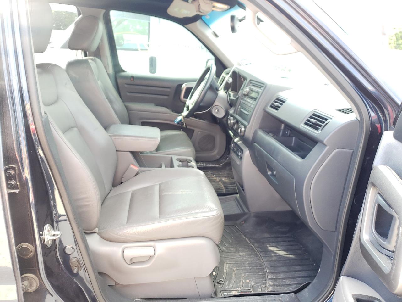 Photo 5 from auction – 2011 HONDA RIDGELINE with VIN 5FPYK1F5XBB008561