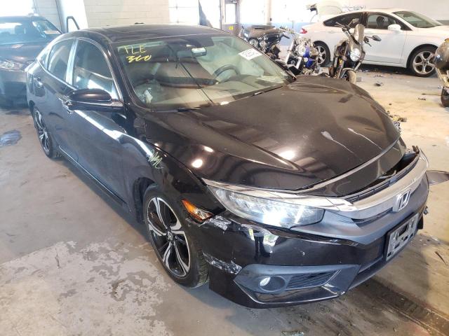 HONDA CIVIC TOUR 2016 with VIN 19XFC1F99GE021279 - Photo from auction