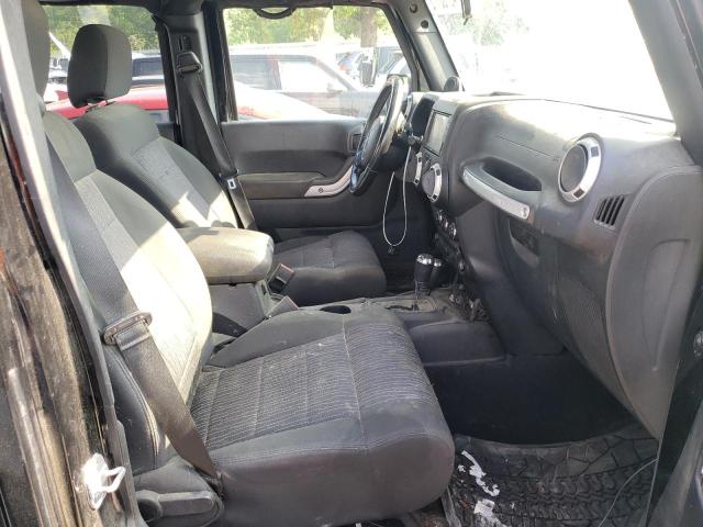 Zdjęcie 5 z aukcji – 2011 JEEP WRANGLER U z VIN 1J4BA5H12BL597938
