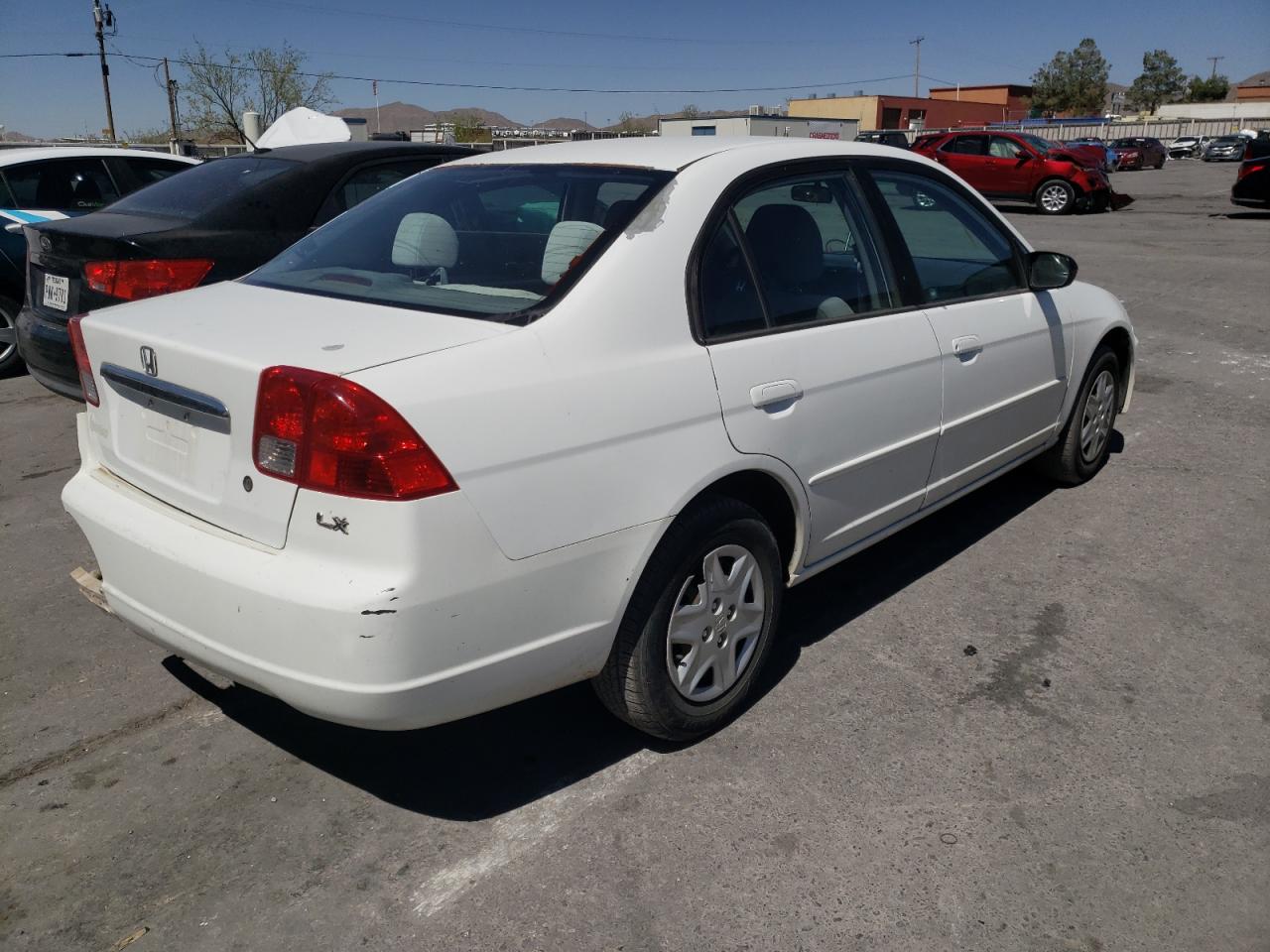 Photo 4 from auction – 2003 HONDA CIVIC LX with VIN 1HGES16573L025894