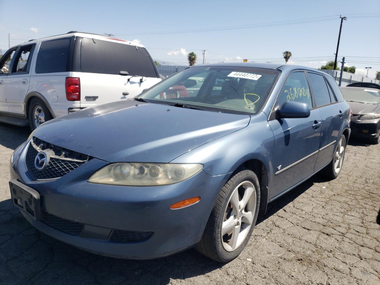 Photo 2 from auction – 2005 MAZDA MAZDA3 with VIN 1YVHP82D755M33381