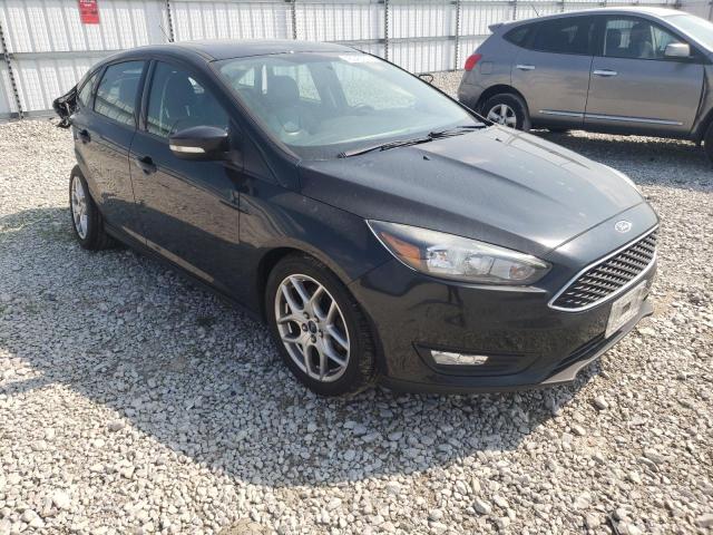 FORD FOCUS SE 2015 with VIN 1FADP3F26FL362807 - Photo from auction