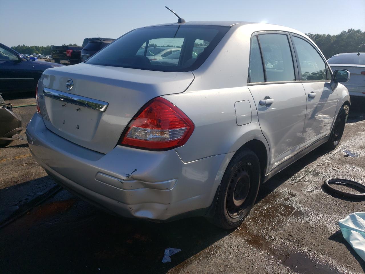 Photo 4 from auction – 2009 NISSAN VERSA S with VIN 3N1BC11E29L394572