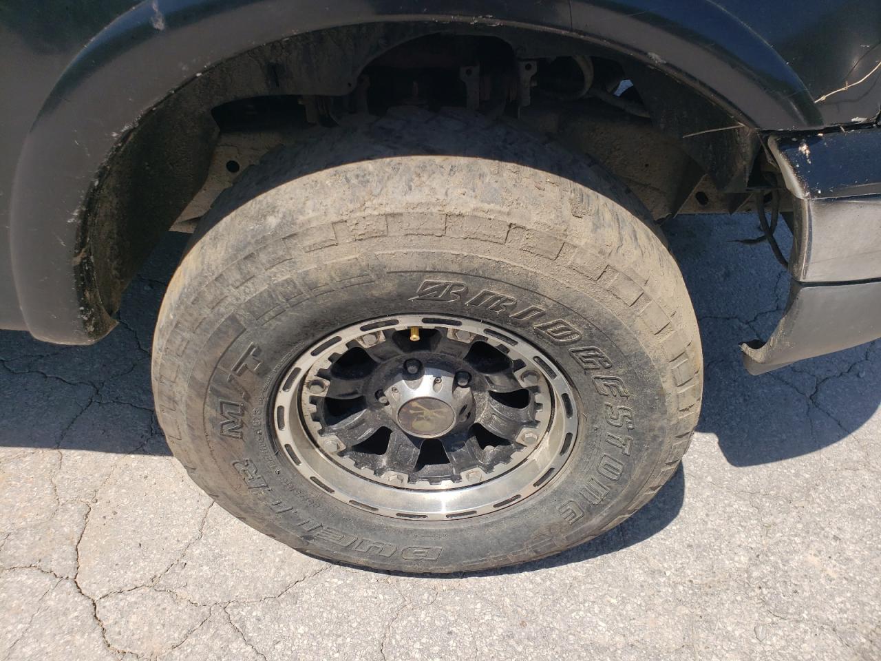 Photo 9 from auction – 2001 FORD F150 with VIN 1FTRX18W51NA84533