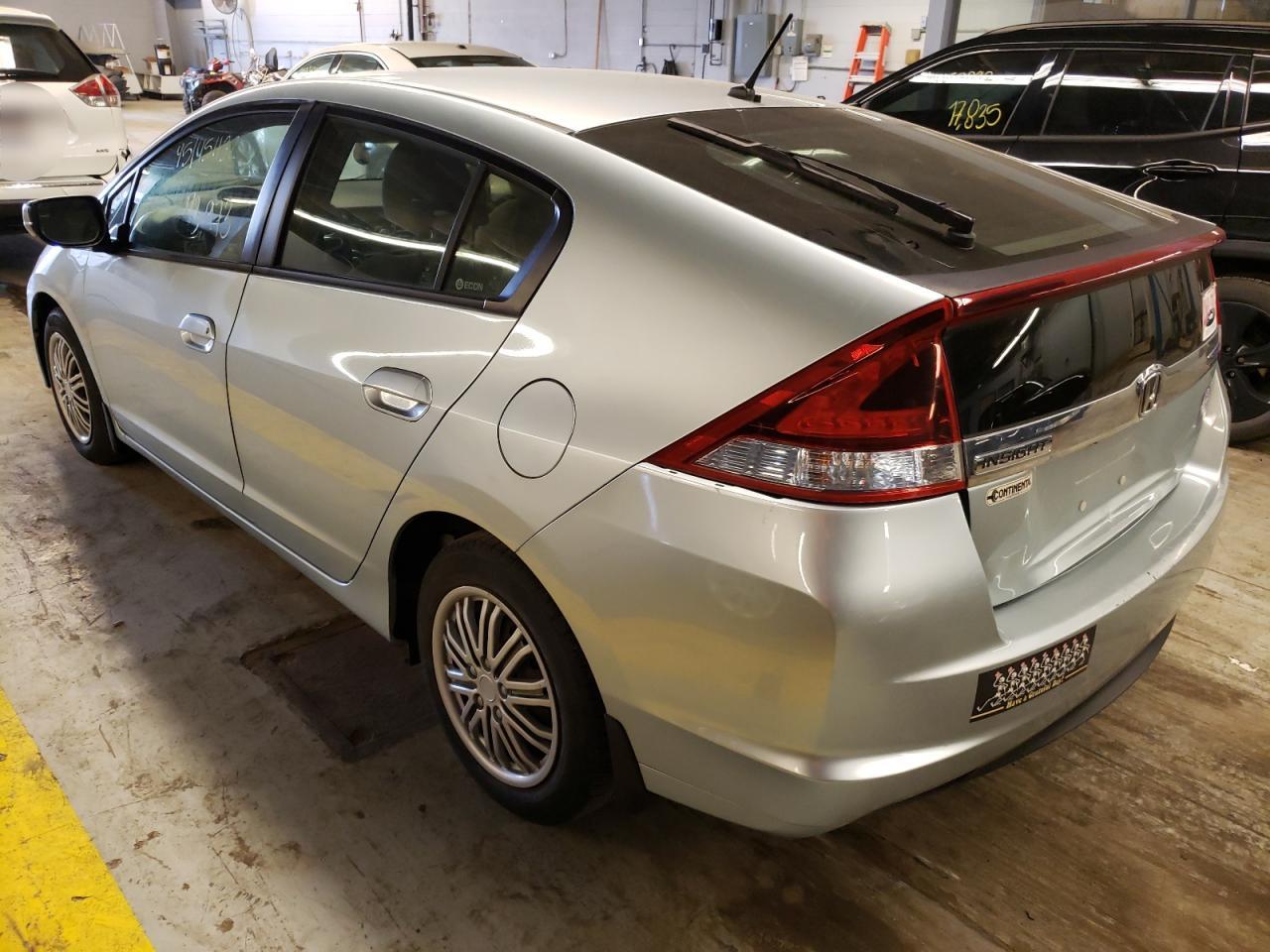 Photo 3 from auction – 2012 HONDA INSIGHT LX with VIN JHMZE2H54CS004144