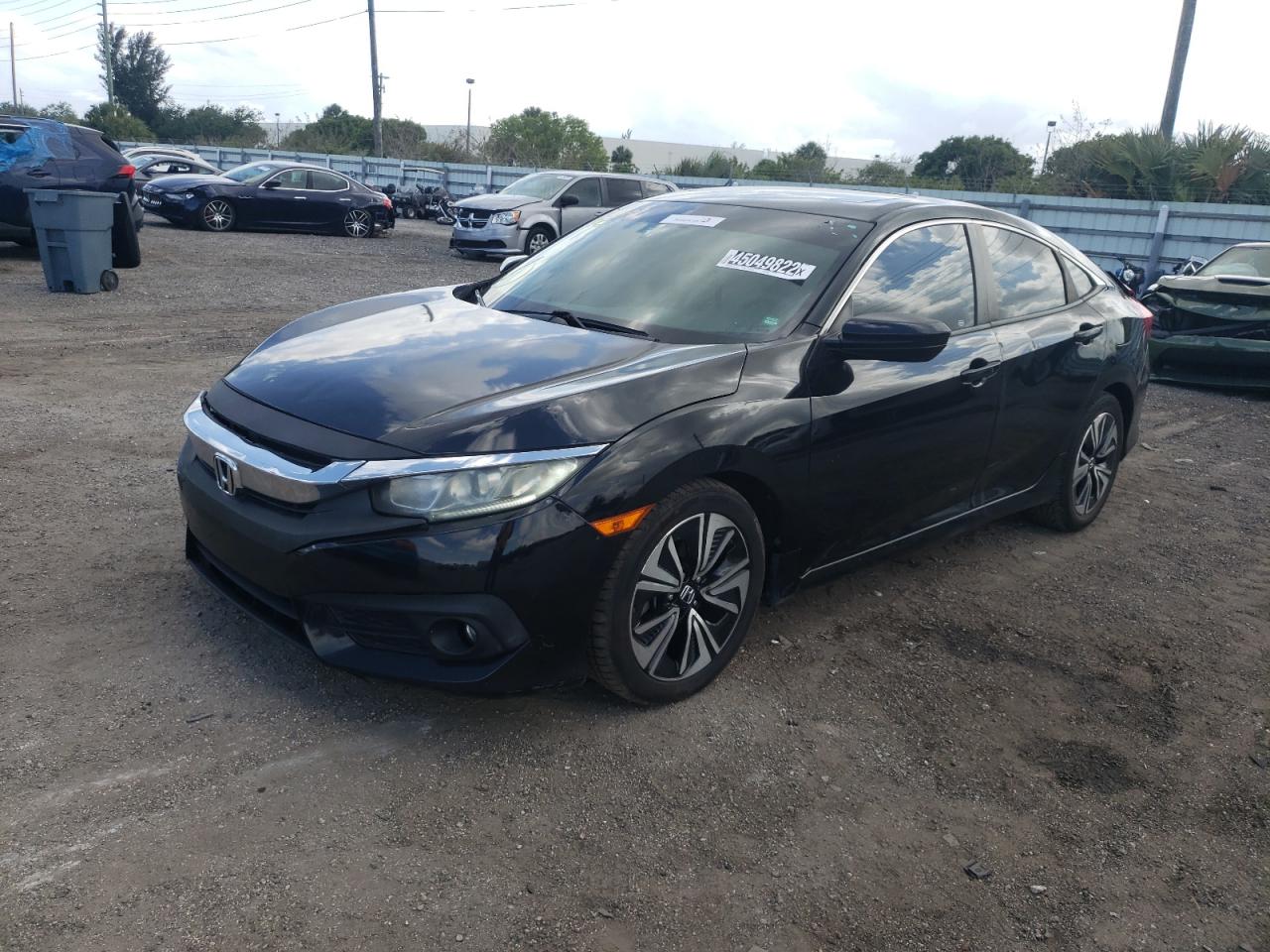 Photo 2 from auction – 2016 HONDA CIVIC EX with VIN 19XFC1F3XGE035154