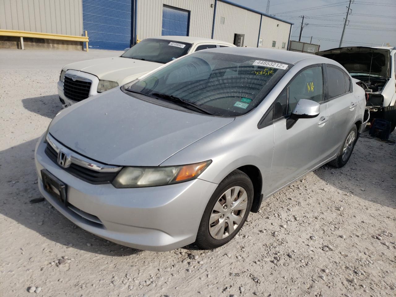 Photo 14 from auction – 2012 HONDA CIVIC LX with VIN 2HGFB2F57CH301515
