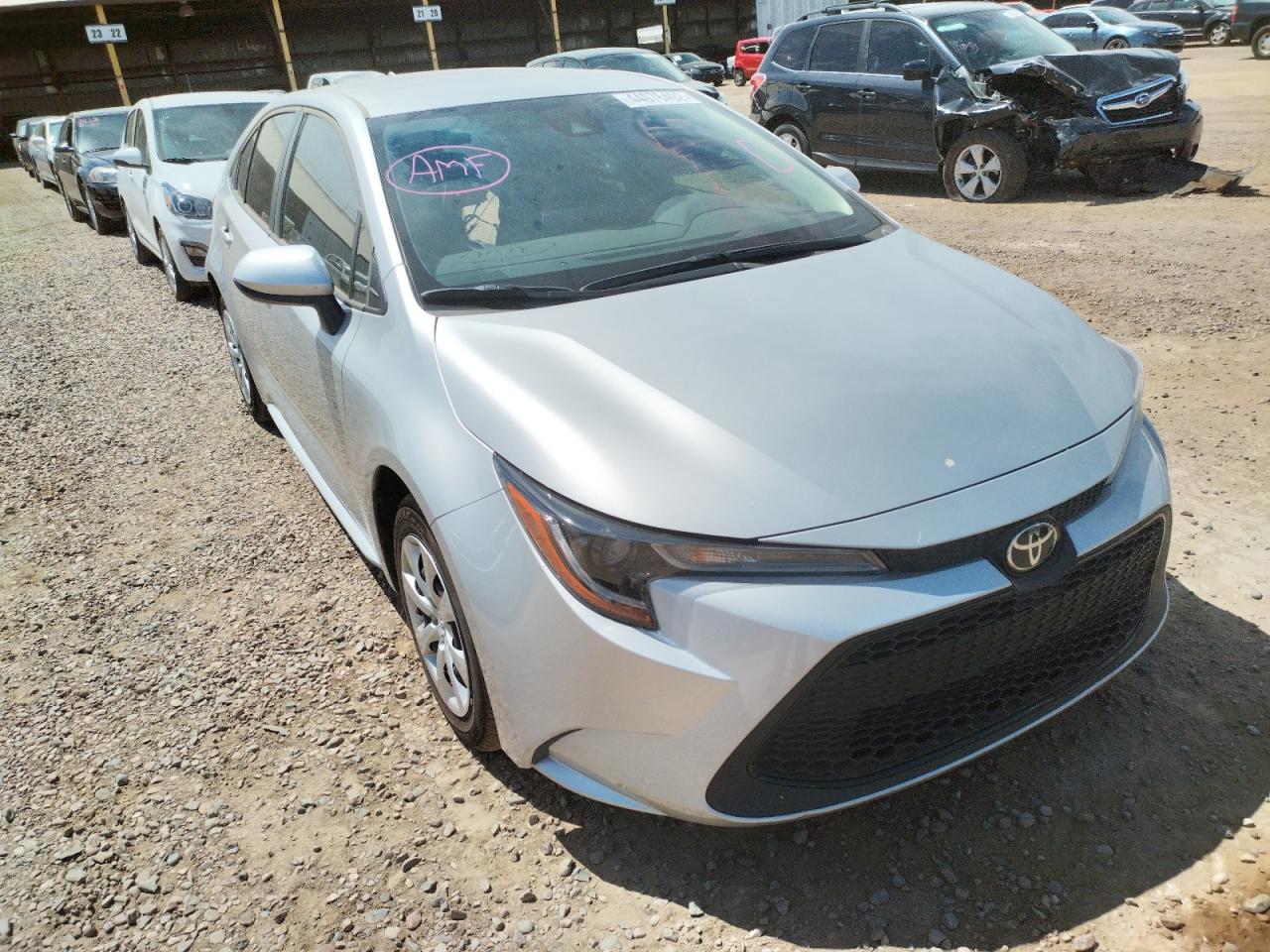 TOYOTA COROLLA LE 2021 with VIN JTDEPMAE7MJ165434 - Photo from auction