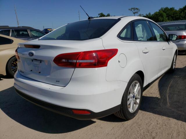 Photo 4 from auction – 2018 FORD FOCUS SE with VIN 1FADP3F21JL263952