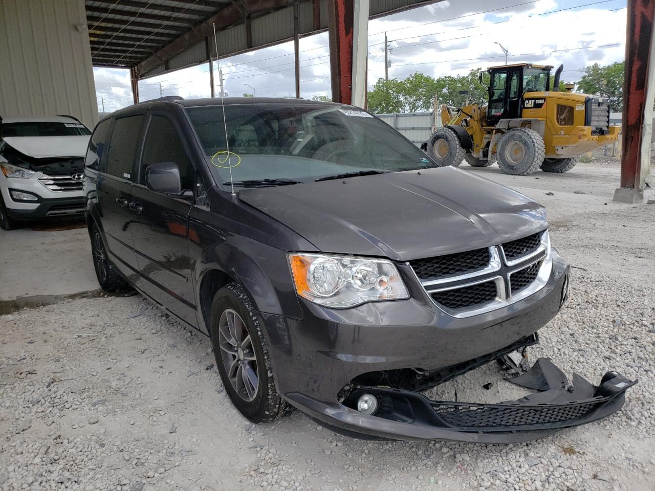 DODGE GRAND CARA 2016 with VIN 2C4RDGCG2GR355894 - Photo from auction