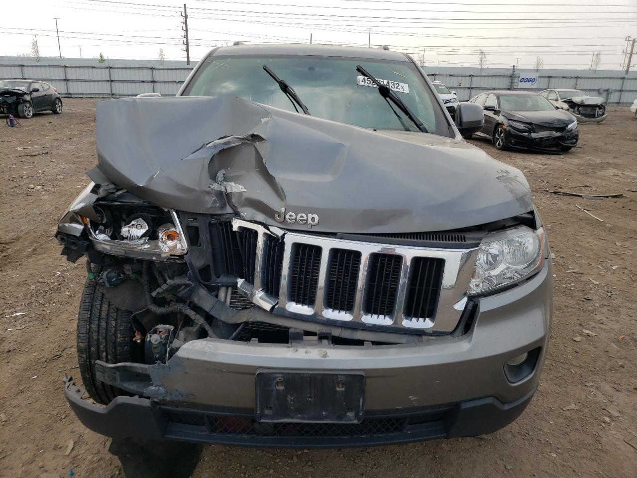 Photo 19 from auction – 2013 JEEP GRAND CHER with VIN 1C4RJFAG0DC612237