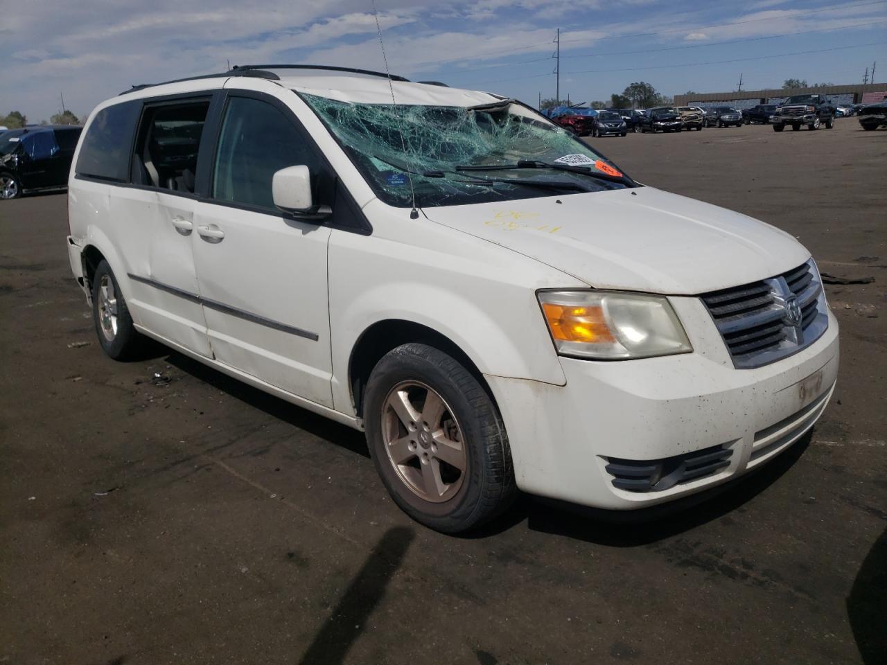 DODGE GRAND CARA 2010 with VIN 2D4RN5D16AR209813 - Photo from auction