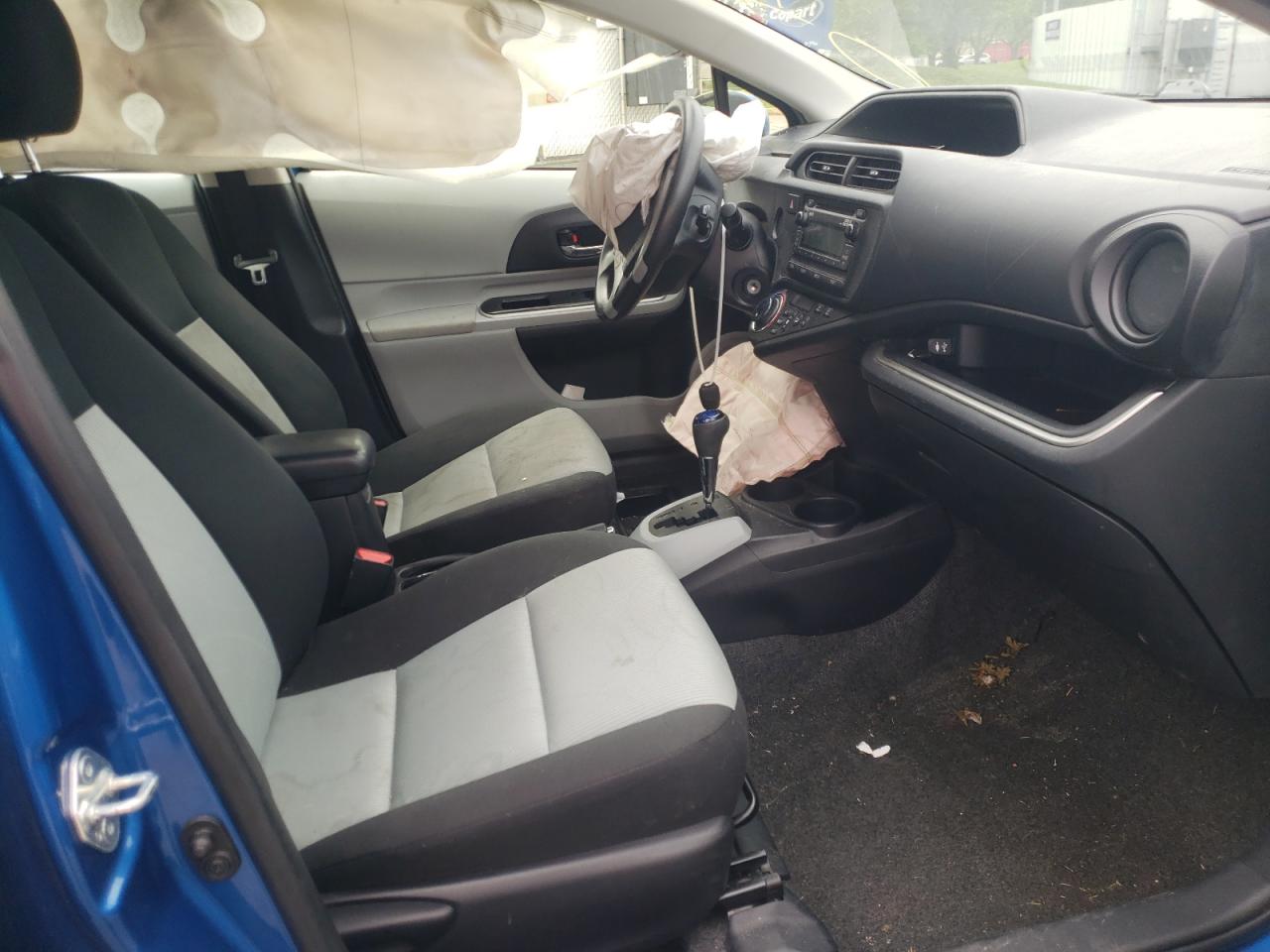 Photo 5 from auction – 2014 TOYOTA PRIUS C with VIN JTDKDTB34E1571420